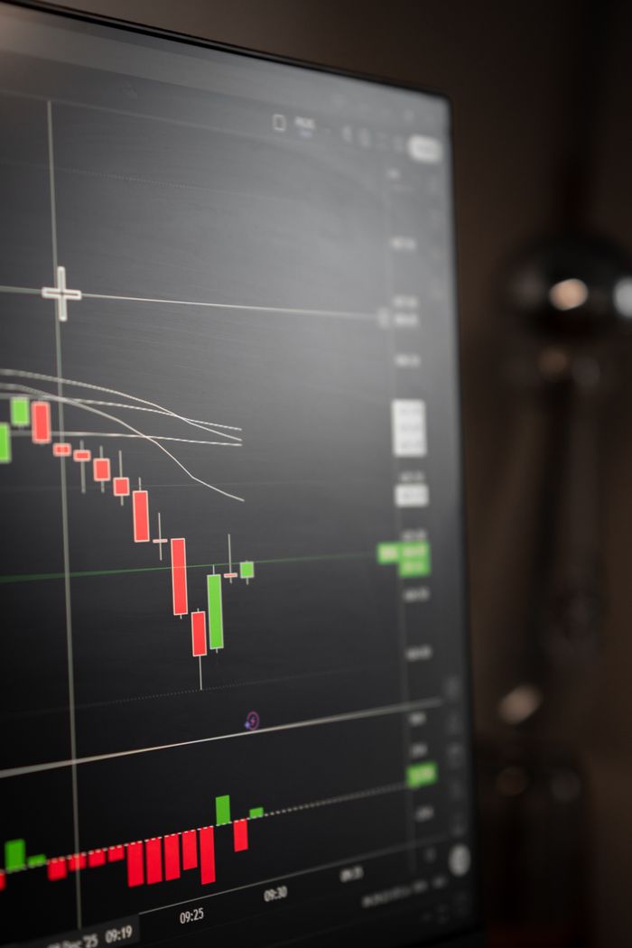 about-01 Detailed view of a stock market graph on a computer screen, showcasing trends.